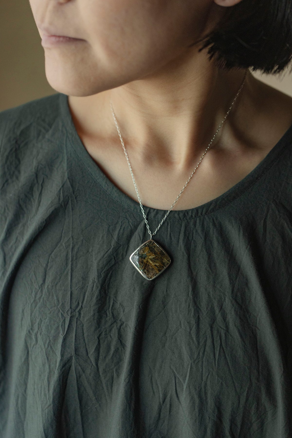 silver necklace  silver top ( rutilated quartz )
