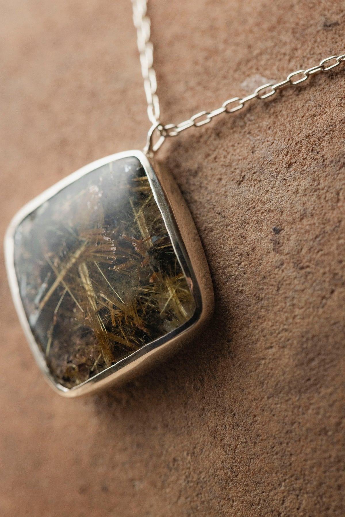 silver necklace  silver top ( rutilated quartz )